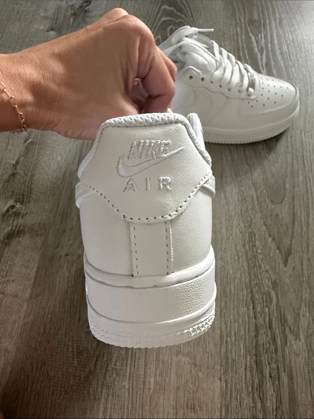 Air Force 1’s Men’s White Low-Top Sneakers